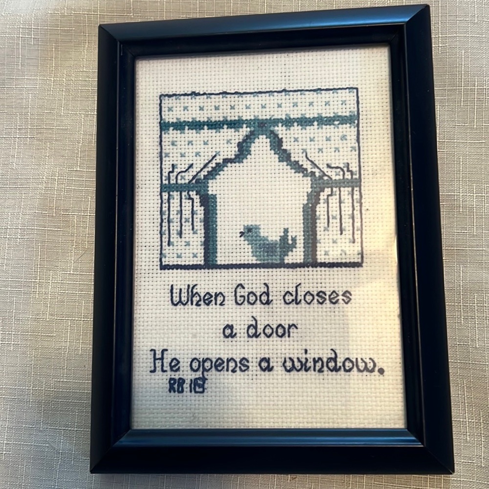 Cross Stitch framed art . Blues , 6 1/4 x8 inches. Dark navy frame